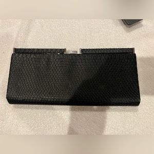 No brand snake print clutch